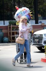 KIRSTEN DUNST Leaves a Party Store in Los Angeles 08/23/2017