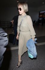 KRISTEN WIIG at Los Angeles International Airport 08/24/2017