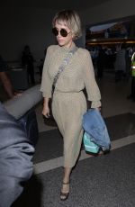 KRISTEN WIIG at Los Angeles International Airport 08/24/2017