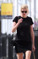 LARA STONE Walks Her Dog Out in London 08/05/2017