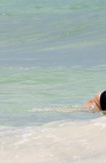 LAURA HARRIER and ALYCIA DEBNAM-CAREY in Swimsuit on the Beach in Tulum 08/13/2017