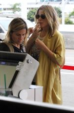 LEANN RIMES at Los Angeles International Airport 08/16/2017