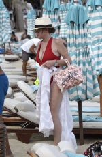 LINDSAY LOHAN in Swimsuit at Nammos Beach in Mykonos 08/21/2017