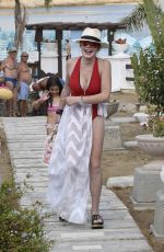 LINDSAY LOHAN in Swimsuit at Nammos Beach in Mykonos 08/21/2017