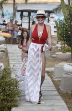 LINDSAY LOHAN in Swimsuit at Nammos Beach in Mykonos 08/21/2017