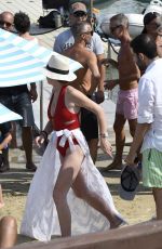 LINDSAY LOHAN in Swimsuit at Nammos Beach in Mykonos 08/21/2017