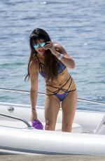 LIZZIE CUNDY in Swimsuit and Bikini on Vacation in Mallorca 08/06/2017
