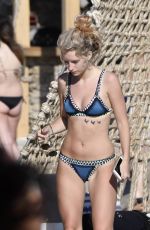 LOTTIE MOSS in Bikini at a Beach in Mykonos 07/31/2017