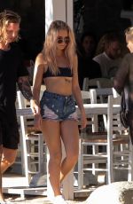 LOTTIE MOSS in Ripped Jean Shorts in Mykonos 07/29/2017