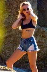 LOTTIE MOSS in Ripped Jean Shorts in Mykonos 07/29/2017