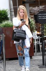 LOTTIE MOSS in Ripped Jeans Out in London 08/04/2017
