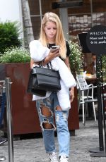 LOTTIE MOSS in Ripped Jeans Out in London 08/04/2017