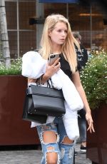 LOTTIE MOSS in Ripped Jeans Out in London 08/04/2017