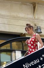 LOUISE BOURGOIN and Aaron Eckhart on the Set of New Series The Romanoffs in Paris 08/10/2017