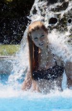 MICHELLE HUNZIKER in Bikini at a Pool in Mendrisio 08/03/2017