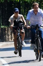 MICHELLE HUNZIKER Ridig a Bicycle Out in Bergamo 08/05/2017