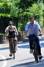 MICHELLE HUNZIKER Ridig a Bicycle Out in Bergamo 08/05/2017