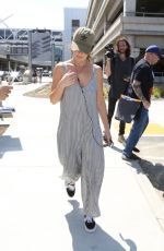 MINKA KELLY at LAX Airport in Los Angeles 08/09/2017