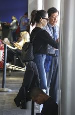 OLIVIA MUNN in Jeans at Los Angeles International Airport 08/08/2017