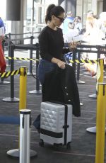 OLIVIA MUNN in Jeans at Los Angeles International Airport 08/08/2017