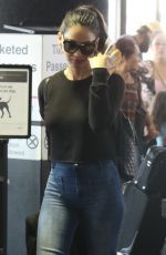 OLIVIA MUNN in Jeans at Los Angeles International Airport 08/08/2017