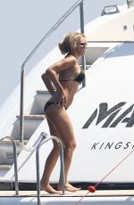PAMELA ANDERSON in Bikini at a Yacht in French Riviera 08/04/2017