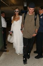 PARIS HILTON and Chris Zlyka at LAX Airport in Los Angeles 08/21/2017