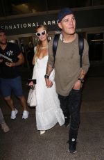 PARIS HILTON and Chris Zlyka at LAX Airport in Los Angeles 08/21/2017