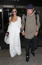 PARIS HILTON and Chris Zlyka at LAX Airport in Los Angeles 08/21/2017