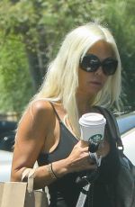 SHAUNA SAND Walks Her Dog Out in Malibu 08/19/2017