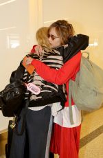 SUKI WATERHOUSE and GEORGIA MAY JAGGER at LAX Airport in Los Angeles 08/14/2017