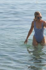 TALLIA STORM in Swimsuit Paddleboarding in Marbella 08/18/2017