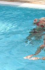 YAZMIN OUKHELLOU and AMBER TURNER in Bikinis at a Pool in Marbella 08/07/2017