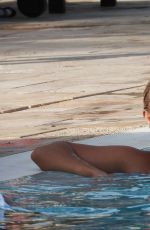 YAZMIN OUKHELLOU and AMBER TURNER in Bikinis at a Pool in Marbella 08/07/2017