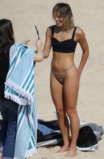 ASHLEY HART in Swimsuit on the Set of at Photoshoot at a Beach in Sydney 09/21/2017