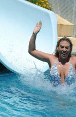 CASEY BATCHELOR and FRANKIE ESSEX in Swimsuits at a Pool in Spain 09/18/2017
