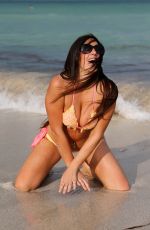 CLAUDIA ROMANI in Bikini on the Beach in Miami 09/20/2017