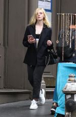 ELLE FANNING Out and About in New York 09/18/2017