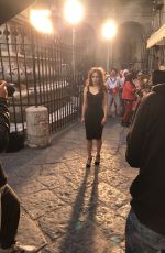 EMILIA CLARKE Filming on the Streets of Naples 09/02/2017