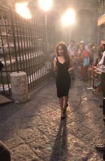 EMILIA CLARKE Filming on the Streets of Naples 09/02/2017