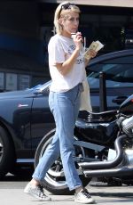 EMMA ROBERTS Having Her Car Washed in Los Angeles 09/26/2017
