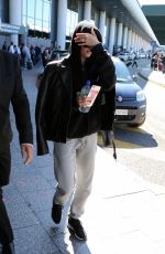 HAILEY BALDWIN Arrives at Malpensa Airport in Milan 09/20/2017