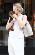 KELLY RUTHERFORD Out with Her Dog in Los Angeles 09/25/2017