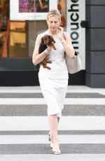 KELLY RUTHERFORD Out with Her Dog in Los Angeles 09/25/2017