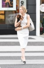 KELLY RUTHERFORD Out with Her Dog in Los Angeles 09/25/2017