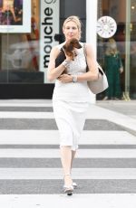 KELLY RUTHERFORD Out with Her Dog in Los Angeles 09/25/2017