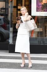 KELLY RUTHERFORD Out with Her Dog in Los Angeles 09/25/2017