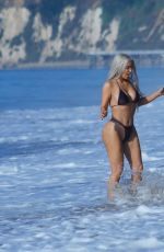 KIM KARDASHIAN in Bikini at a Beach in Malibu 09/20/2017