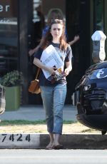 LILY COLLINS Out Shopping in Los Angeles 09/20/2017