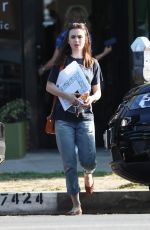 LILY COLLINS Out Shopping in Los Angeles 09/20/2017